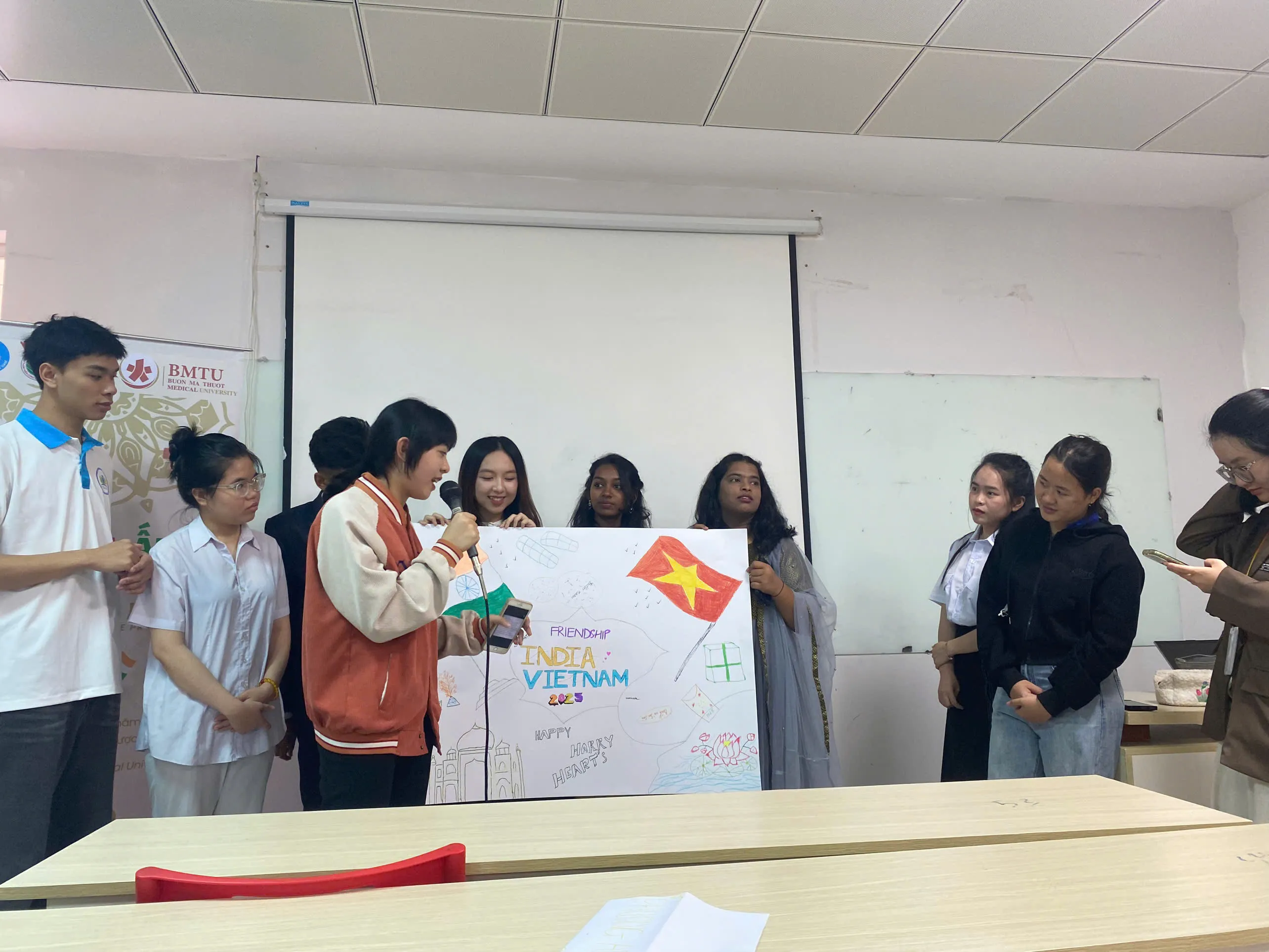 BMU students showcasing artwork at exhibition